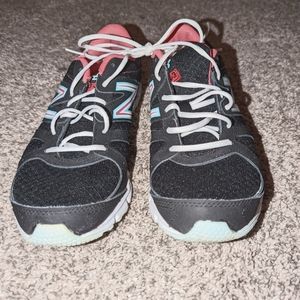 New Balance women running sneakers .. Size 7.5 black with hot Pink/babyblue